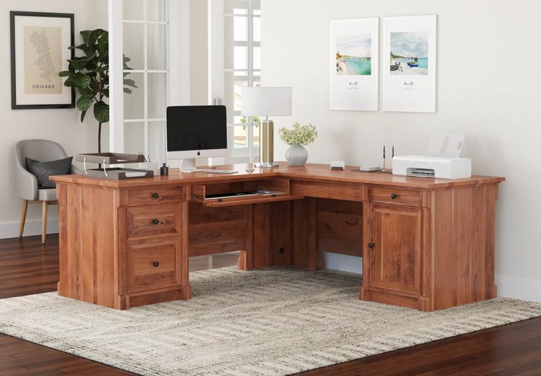 solid wood L shaped desk in a office.