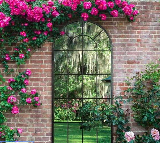 Arched Wall Mounted Mirror for Visual Impact.