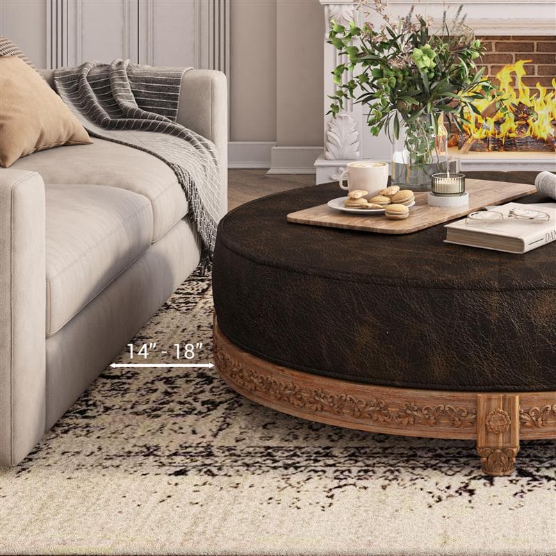 Carling 60 Inch Round Leather Ottoman Coffee Table