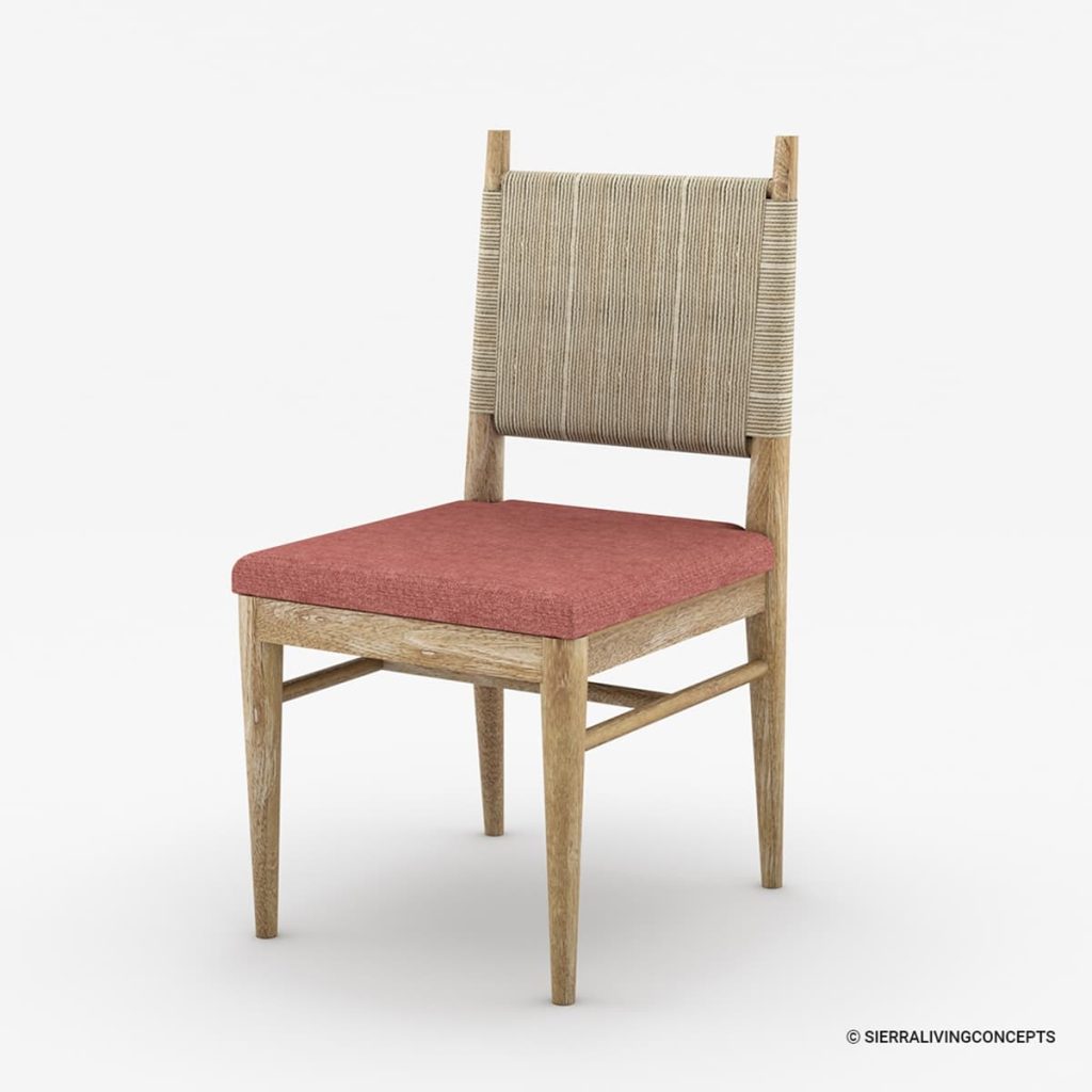 Wood dining chair with a woven back and coral fabric seat cushion.