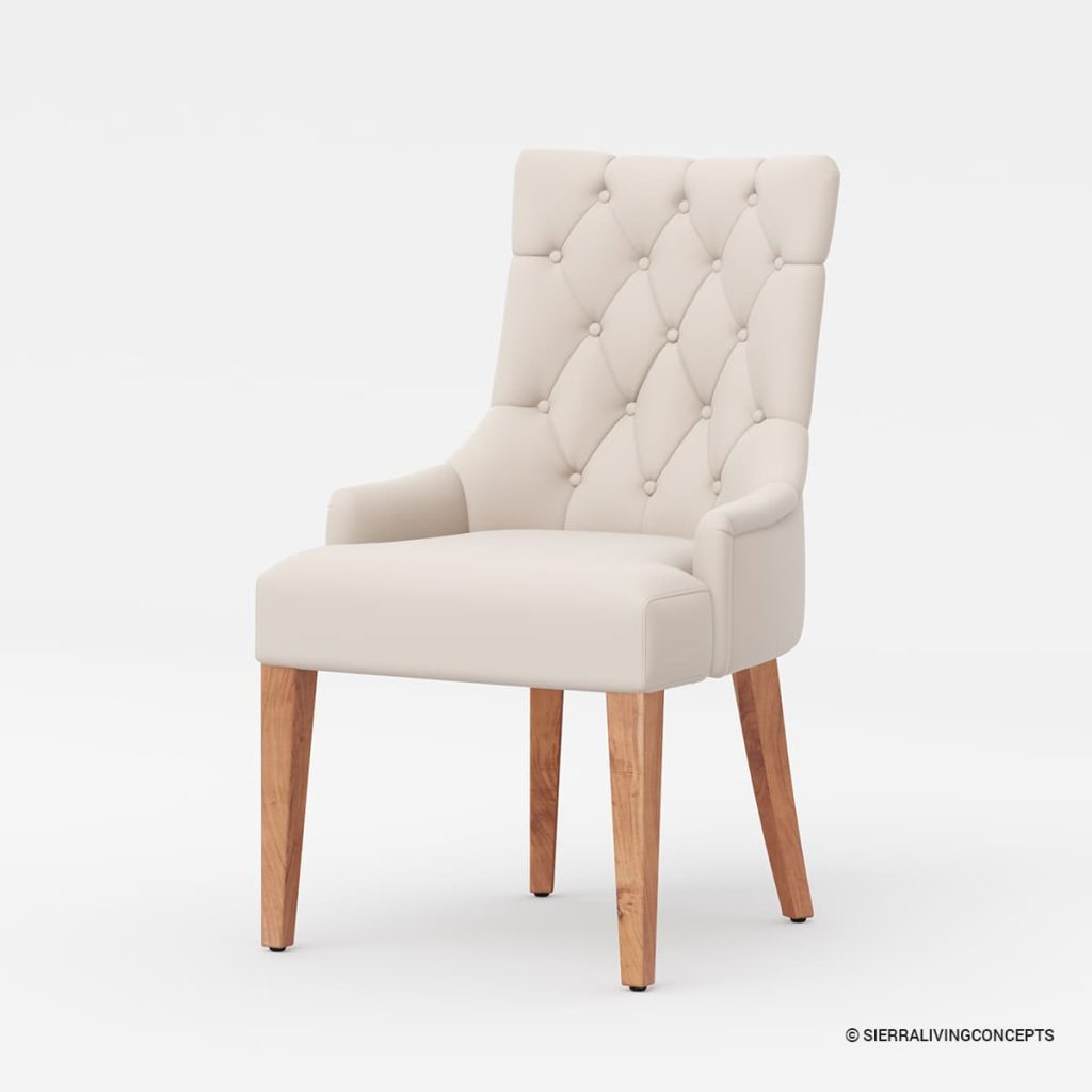 Tufted cream upholstered dining chair with wood legs.