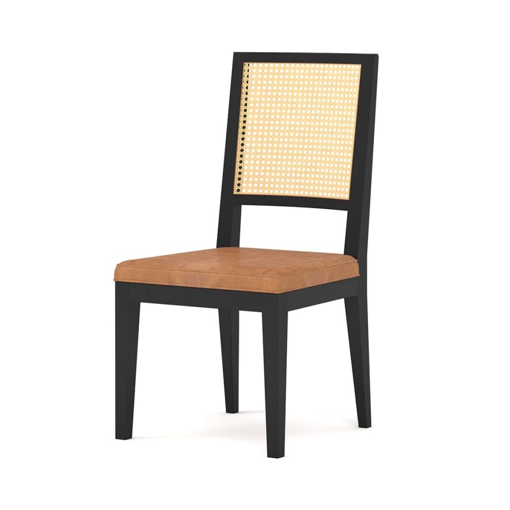 Black dining chair with a cane-back panel and tan leather seat.