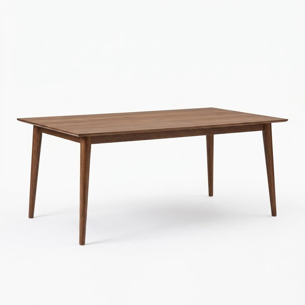 Mid-century walnut dining table with tapered legs.