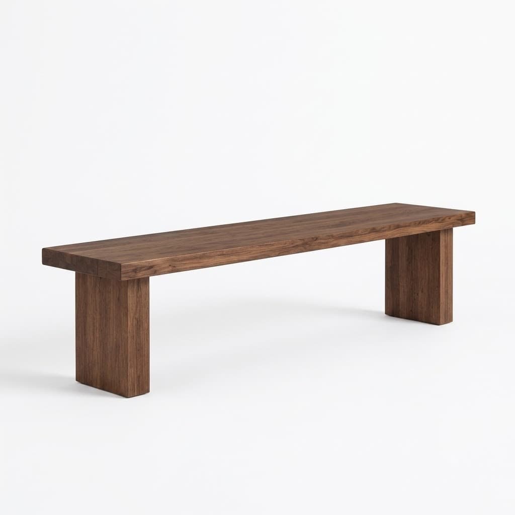 Solid walnut dining bench with thick block legs and a clean modern silhouette.