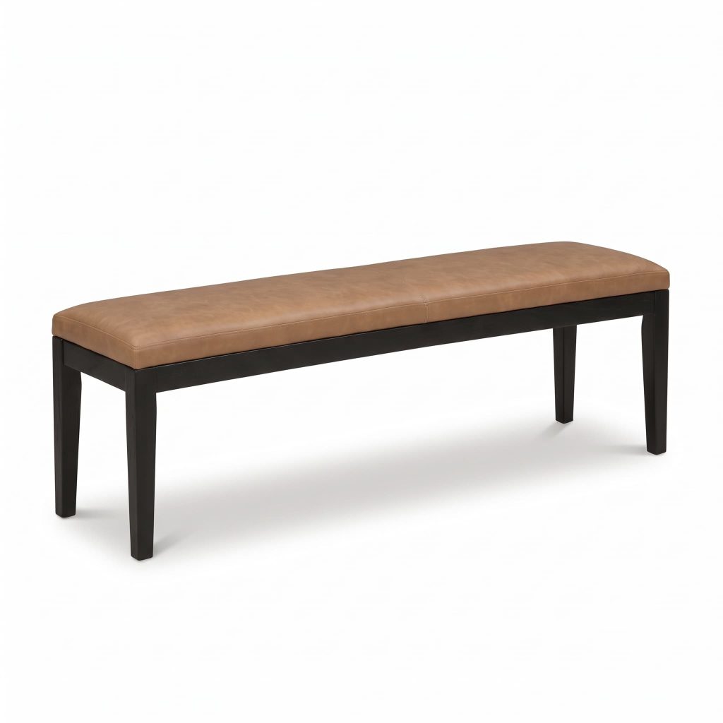 Black wood dining bench with a tan leather cushioned top.
